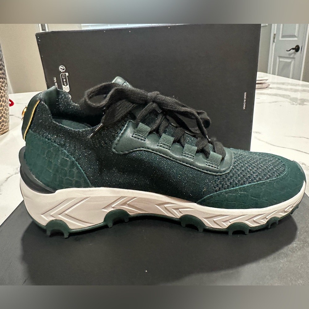 Stylish Green Sneakers with Black Laces